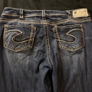 vintage low waisted silver jeans